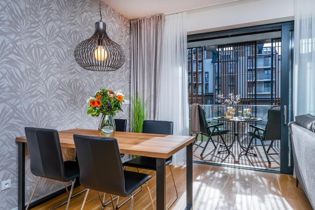 Posezení v ubytování Apartament I313 Molo Lipno with private wellness