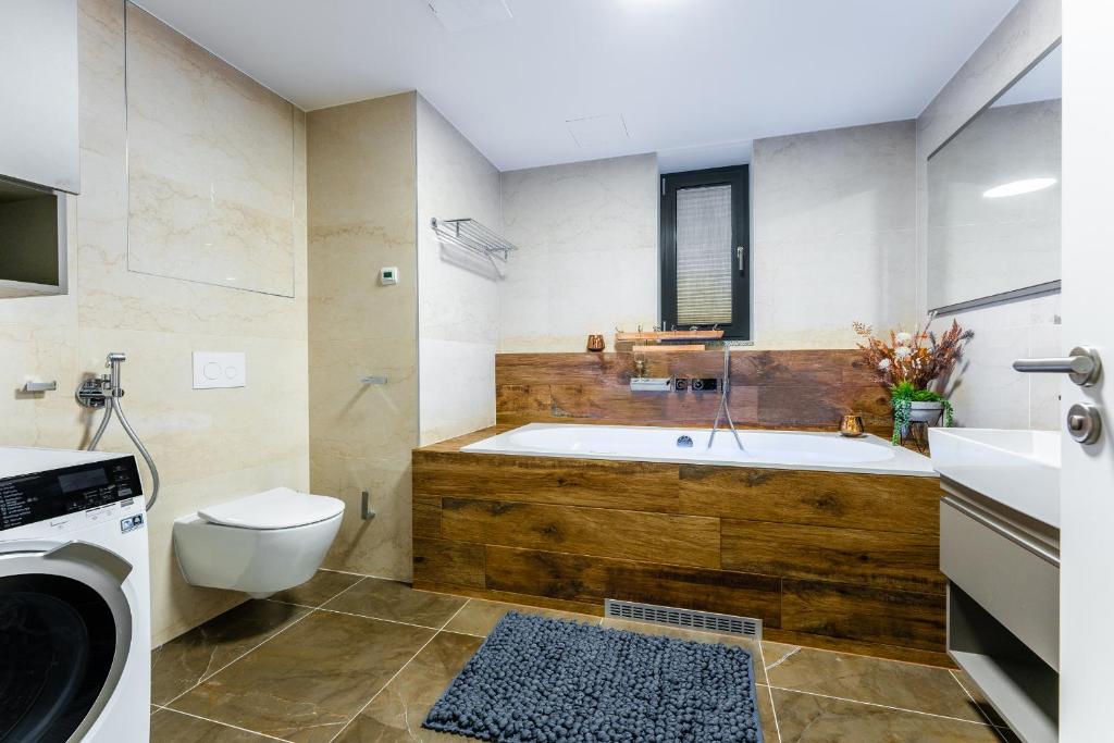 Koupelna v ubytování Apartament I313 Molo Lipno with private wellness