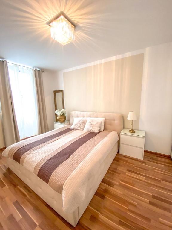 Postel nebo postele na pokoji v ubytování Apartment #Story