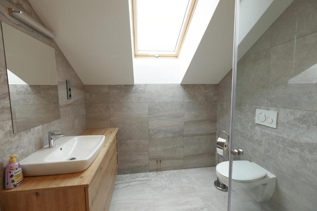 Koupelna v ubytování Apartmány U Květné zahrady