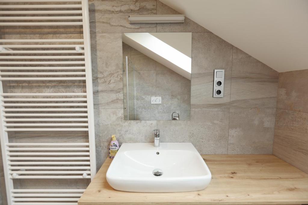 Koupelna v ubytování Apartmány U Květné zahrady