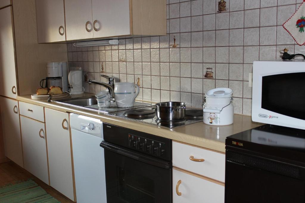 A kitchen or kitchenette at Bauernhof Hammerer