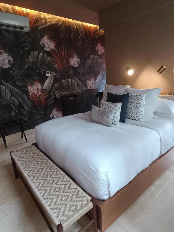 Postel nebo postele na pokoji v ubytování Hotel Casona del Porvenir