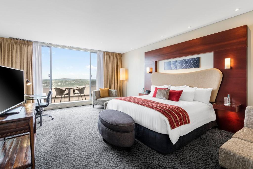 Postel nebo postele na pokoji v ubytování Crowne Plaza Auckland by IHG