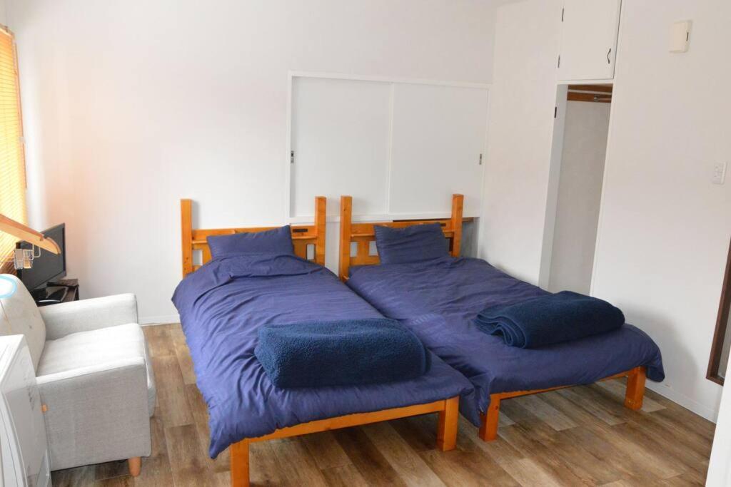 Krevet ili kreveti u jedinici u okviru objekta Zenibako House 3F-RoomC