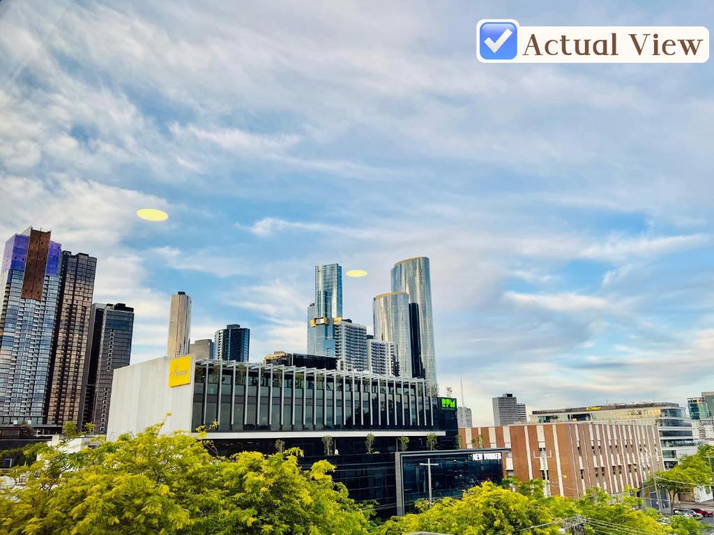 a view of a city skyline with tall buildings at Clarendon Hotel in Melbourne