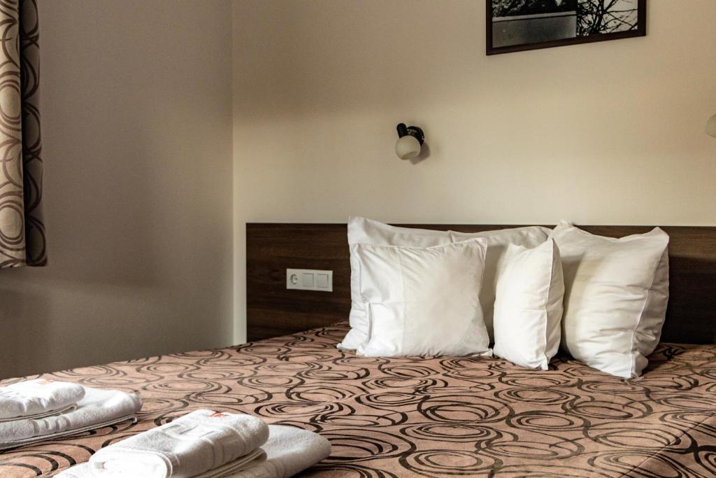 Postel nebo postele na pokoji v ubytování Casa Tofi Vendégház