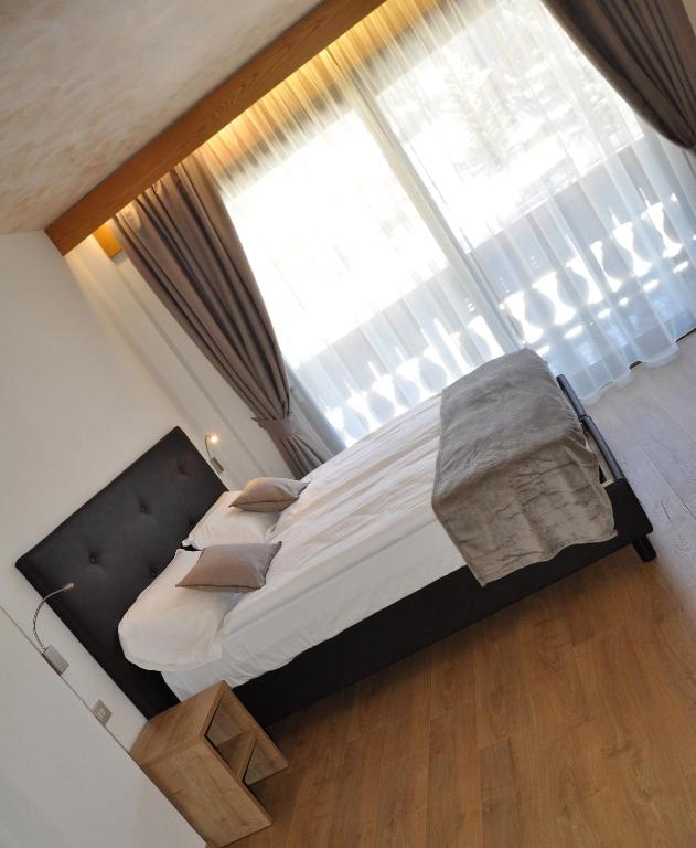 Letto o letti in una camera di Residence Anda