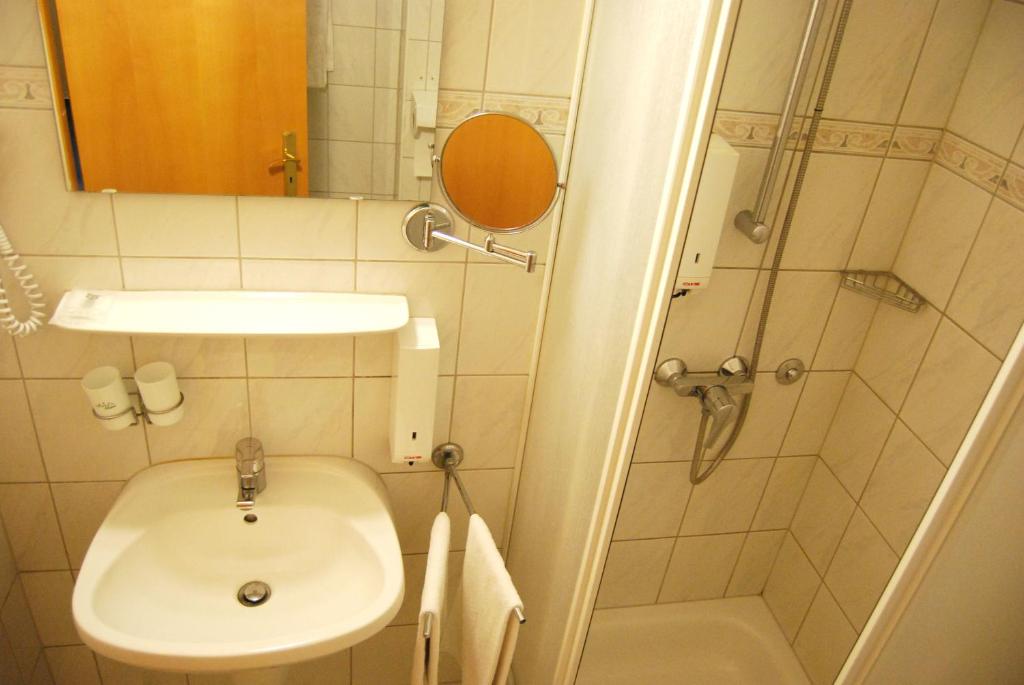 Łazienka w obiekcie Hotel Baross