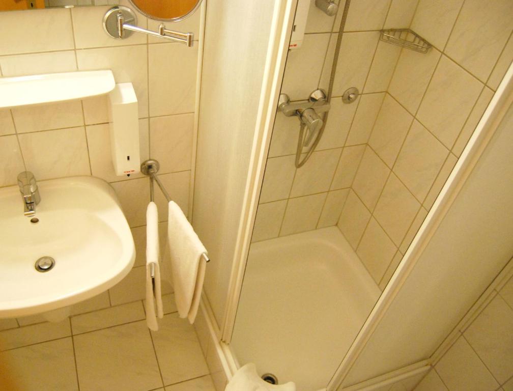 Łazienka w obiekcie Hotel Baross