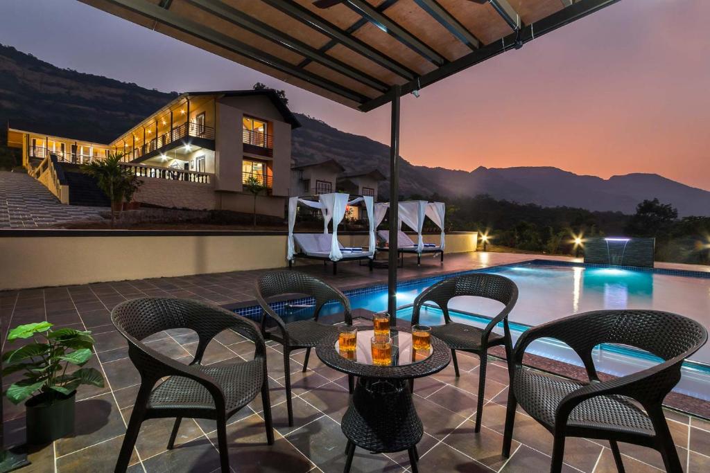 Asanjo Villa by StayVista Mulshi's lush beauty with Eclectic