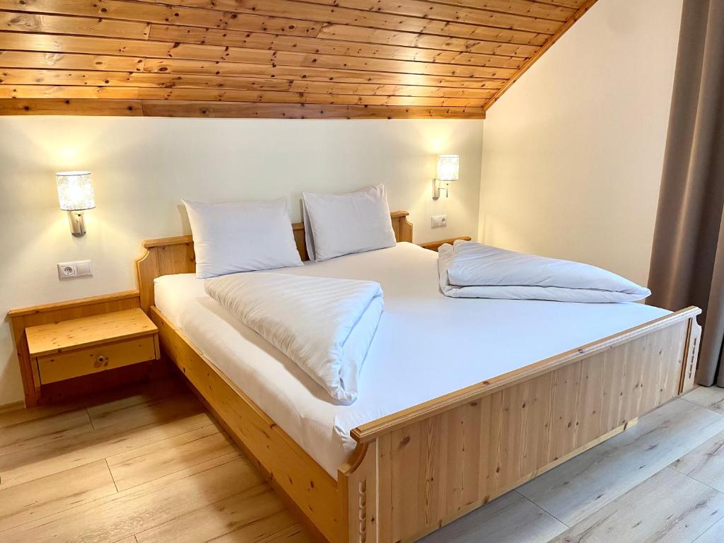 Postel nebo postele na pokoji v ubytování Haus Seerose