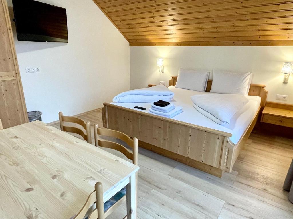 Postel nebo postele na pokoji v ubytování Haus Seerose