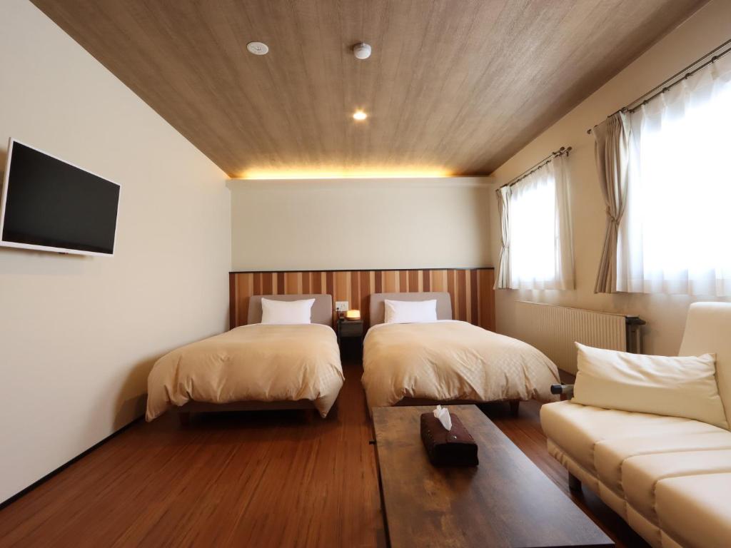 Postel nebo postele na pokoji v ubytování Villa Monrepos