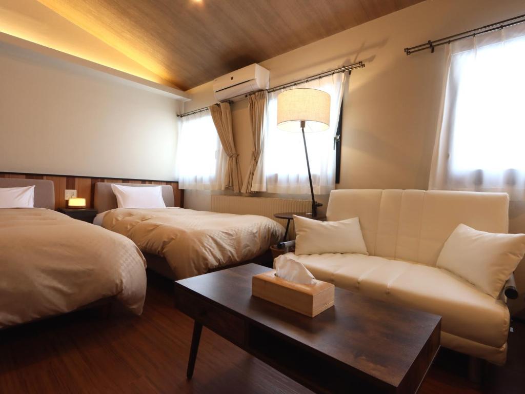 Postel nebo postele na pokoji v ubytování Villa Monrepos