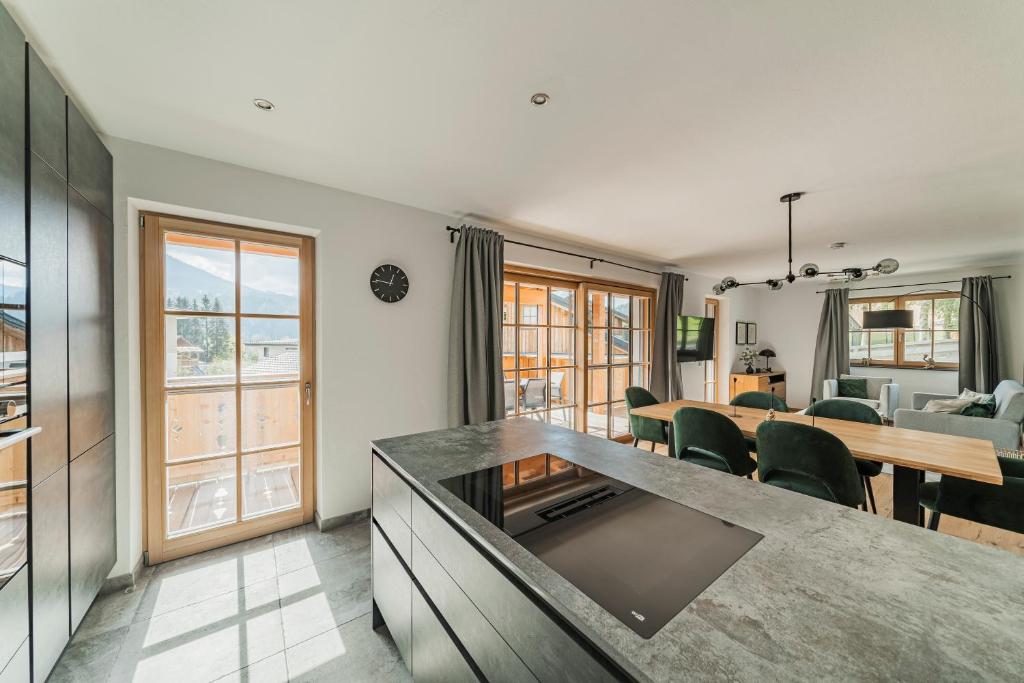 Kuchyň nebo kuchyňský kout v ubytování Dachstein West Apartment T3