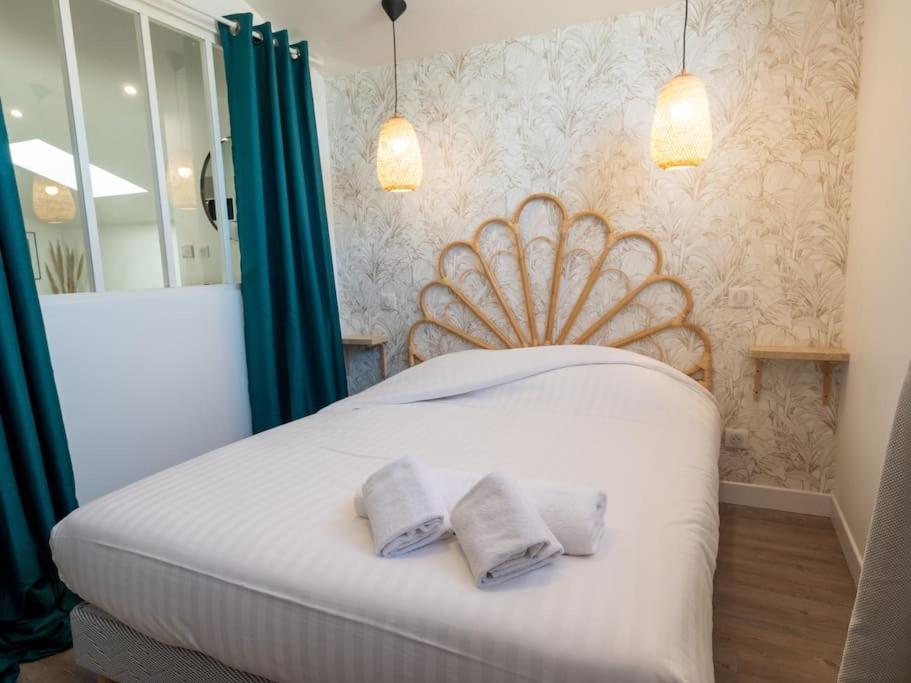 Posteľ alebo postele v izbe v ubytovaní Saint-Gilles-Croix-de-Vie, Charmant appartement 4pers 'O MERCADO'