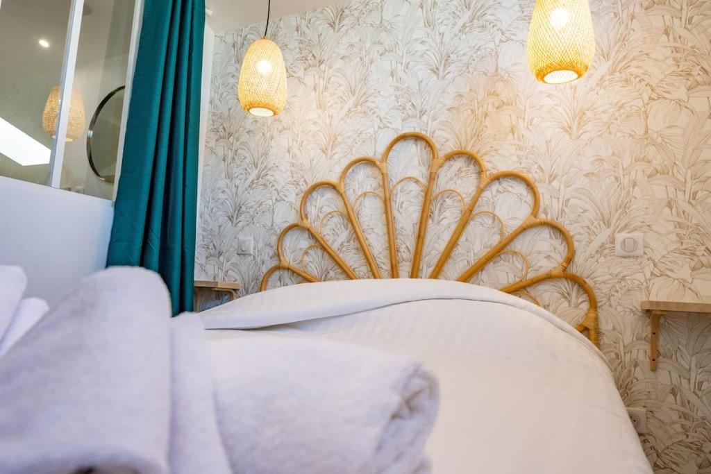 Posteľ alebo postele v izbe v ubytovaní Saint-Gilles-Croix-de-Vie, Charmant appartement 4pers 'O MERCADO'
