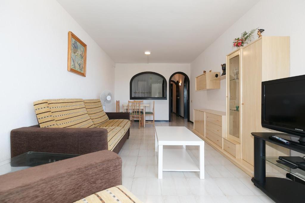 TV a/nebo společenská místnost v ubytování UHC Los Flamencos Family Apartments