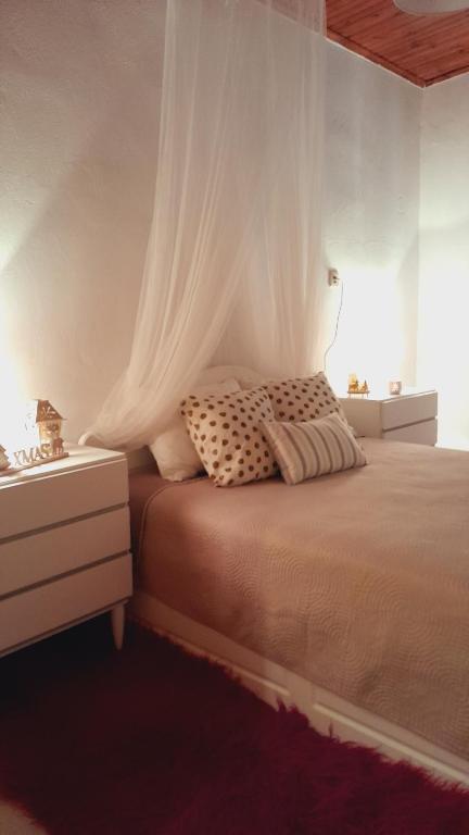 A bed or beds in a room at Gorjelina `s House