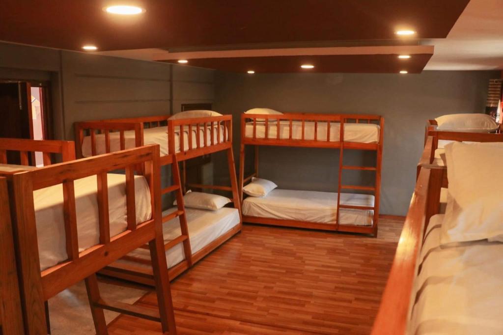 Postel nebo postele na pokoji v ubytování Harry's Home