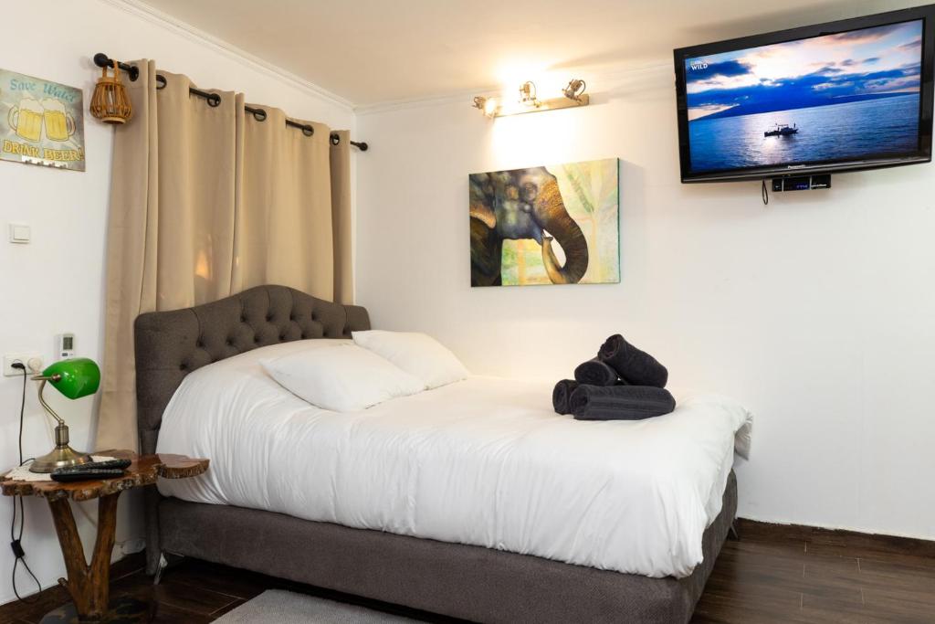 Postel nebo postele na pokoji v ubytování Bubas place