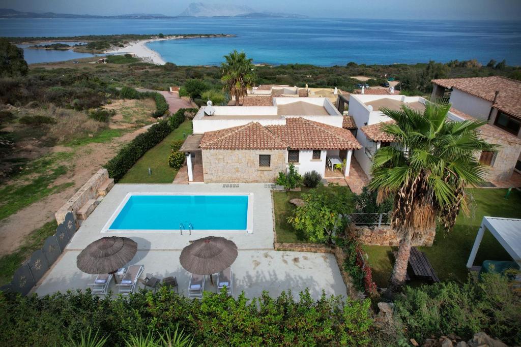 an aerial view of a villa with a swimming pool at Villa Isuledda Lux in San Teodoro