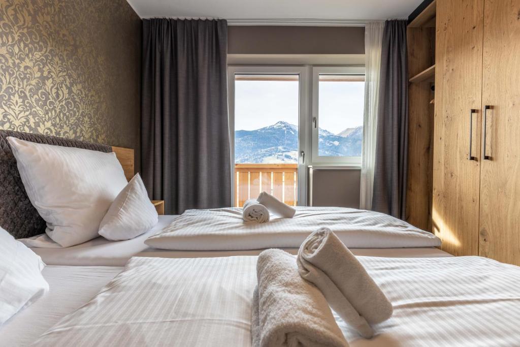 Posteľ alebo postele v izbe v ubytovaní Zugspitz Residence Ehrwald