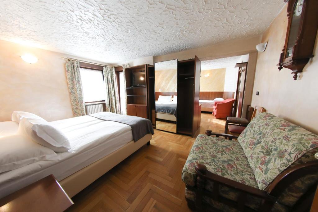 Cama ou camas em um quarto em HOTEL SPORTING