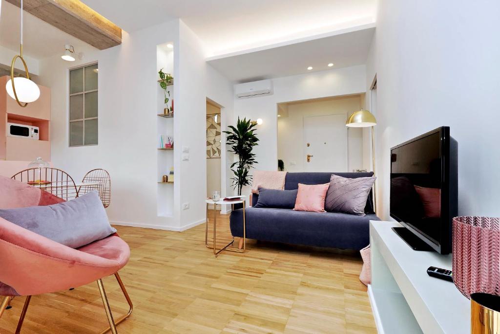Televízia a/alebo spoločenská miestnosť v ubytovaní YCH-Glamour flat