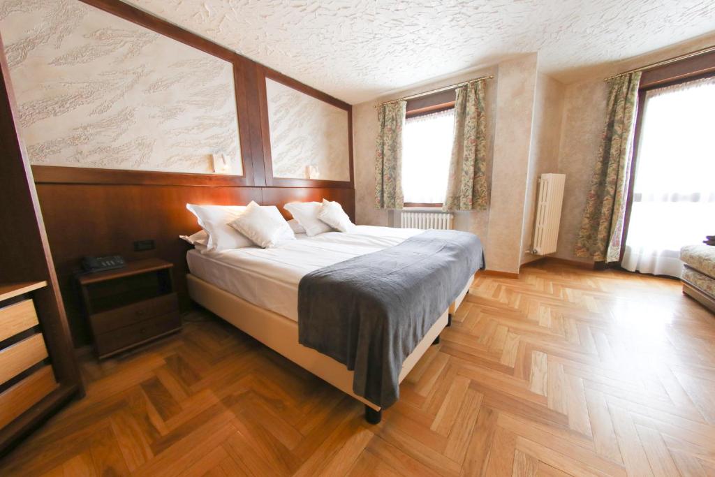 Cama ou camas em um quarto em HOTEL SPORTING