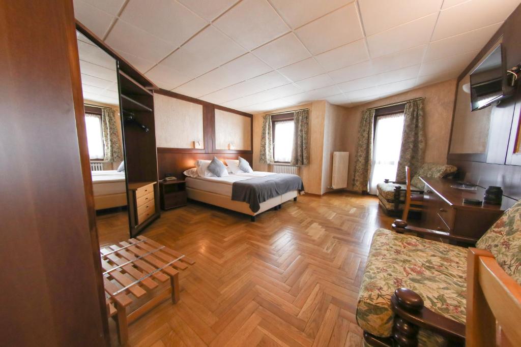 Cama ou camas em um quarto em HOTEL SPORTING