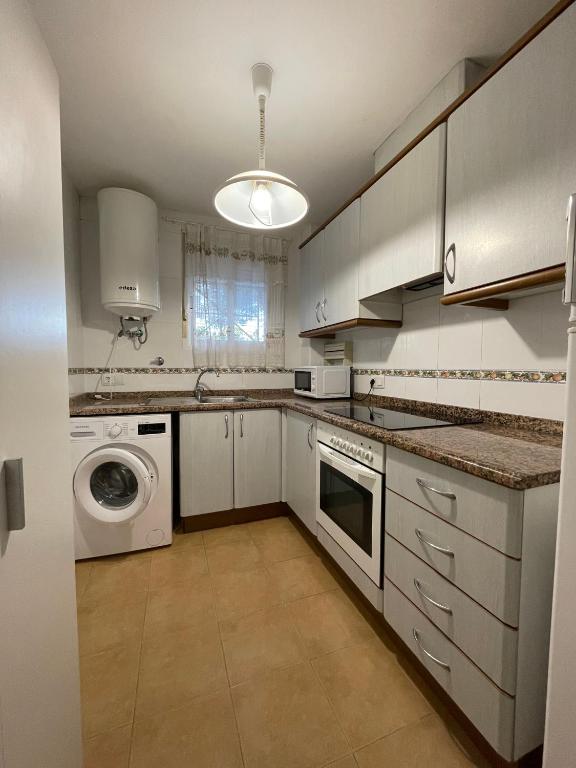 Kuchyň nebo kuchyňský kout v ubytování Alpen1 Residencial Edison