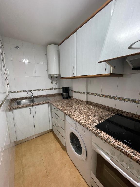 Kuchyň nebo kuchyňský kout v ubytování Alpen1 Residencial Edison
