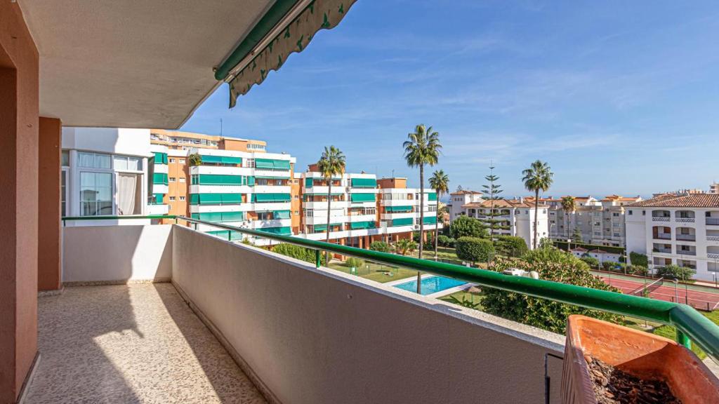a balcony with a view of some buildings at 797 Holiday Rentals - Espacioso apartamento para 6 en torremolinos in Torremolinos