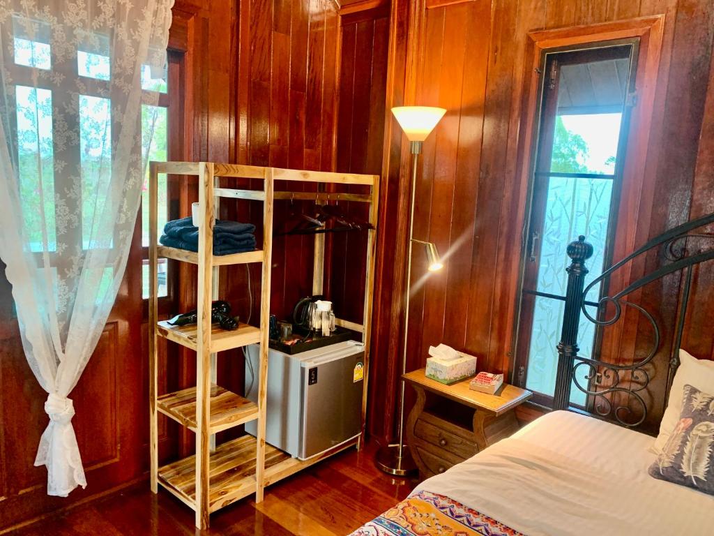 Postel nebo postele na pokoji v ubytování Rang Robin Farmstay with swimming pool