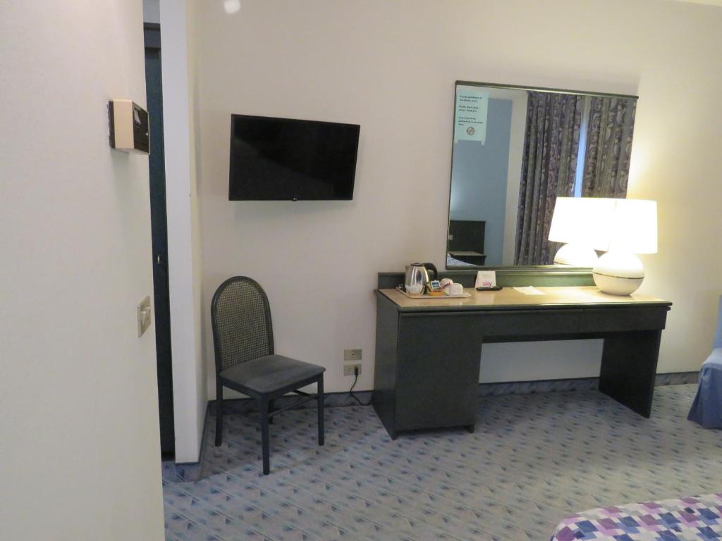 TV a/nebo společenská místnost v ubytování Hotel Turandot