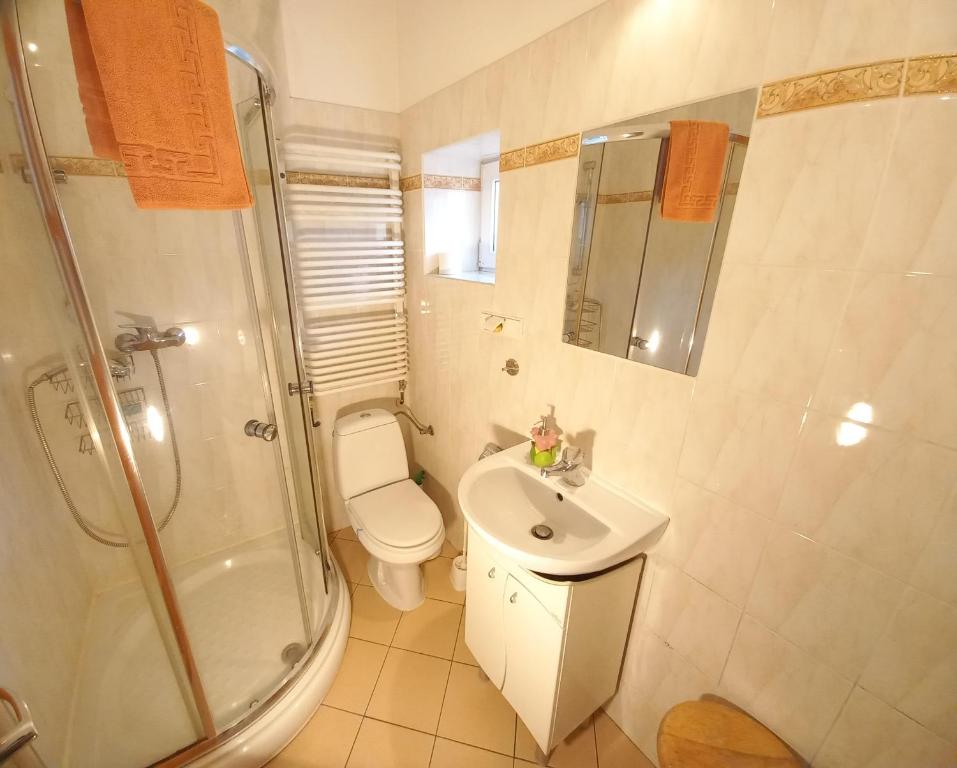 Koupelna v ubytování Apartamenty Maria