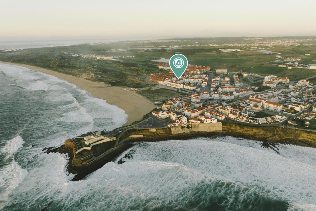 an aerial view of a beach with a hot air balloon at Best Houses 58 - Cozy apartment in Consolação Beach in Peniche