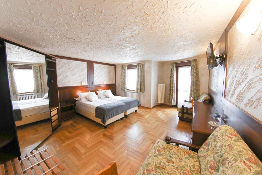 Cama ou camas em um quarto em HOTEL SPORTING
