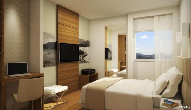 TV a/nebo společenská místnost v ubytování Linhares Design Hotel