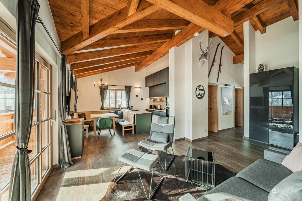 Posezení v ubytování Dachstein West Apartment T5