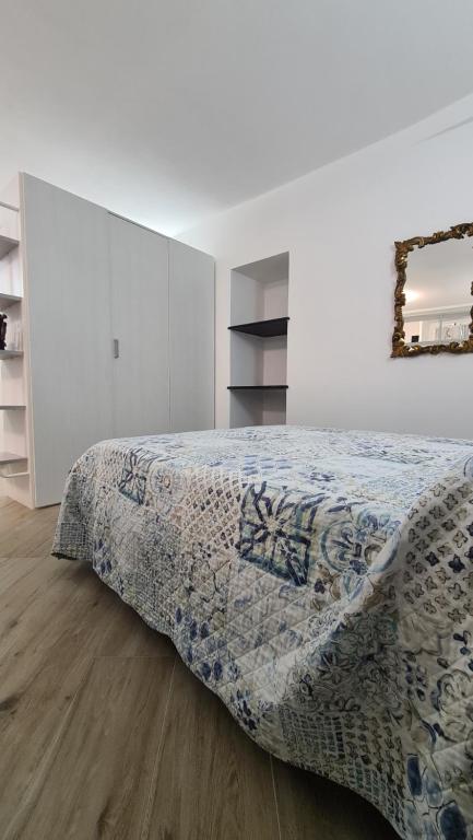 Posteľ alebo postele v izbe v ubytovaní LA CASA DI IA
