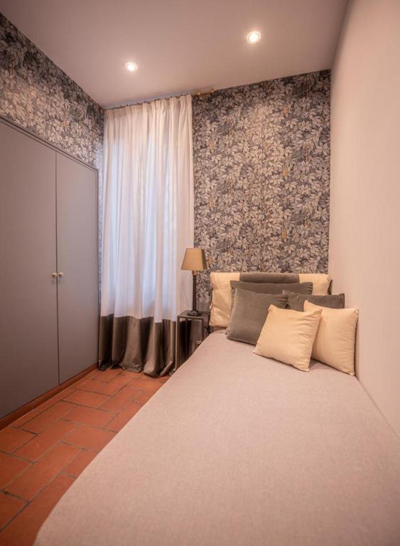 Łóżko lub łóżka w pokoju w obiekcie Anna Trevi 52 Luxury appartment
