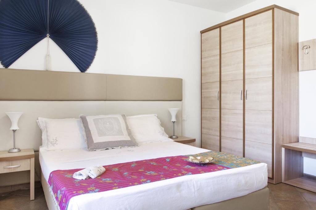Postel nebo postele na pokoji v ubytování Eden Park Resort
