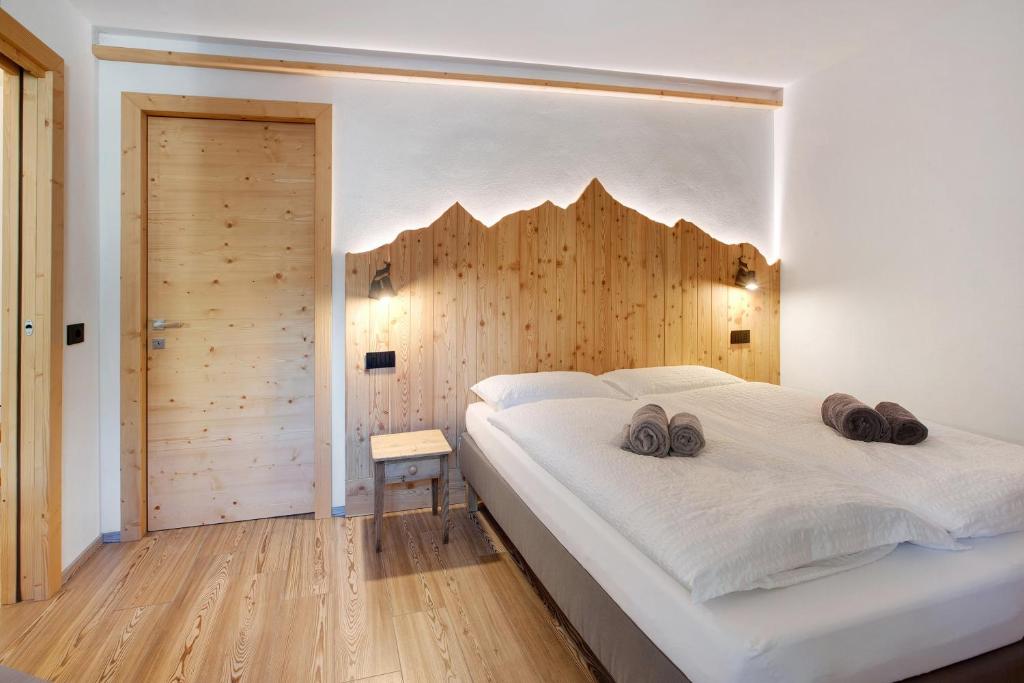 Posteľ alebo postele v izbe v ubytovaní Olympic Chalet 11