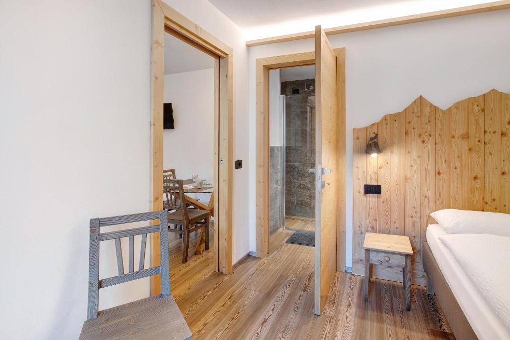 Posteľ alebo postele v izbe v ubytovaní Olympic Chalet 11