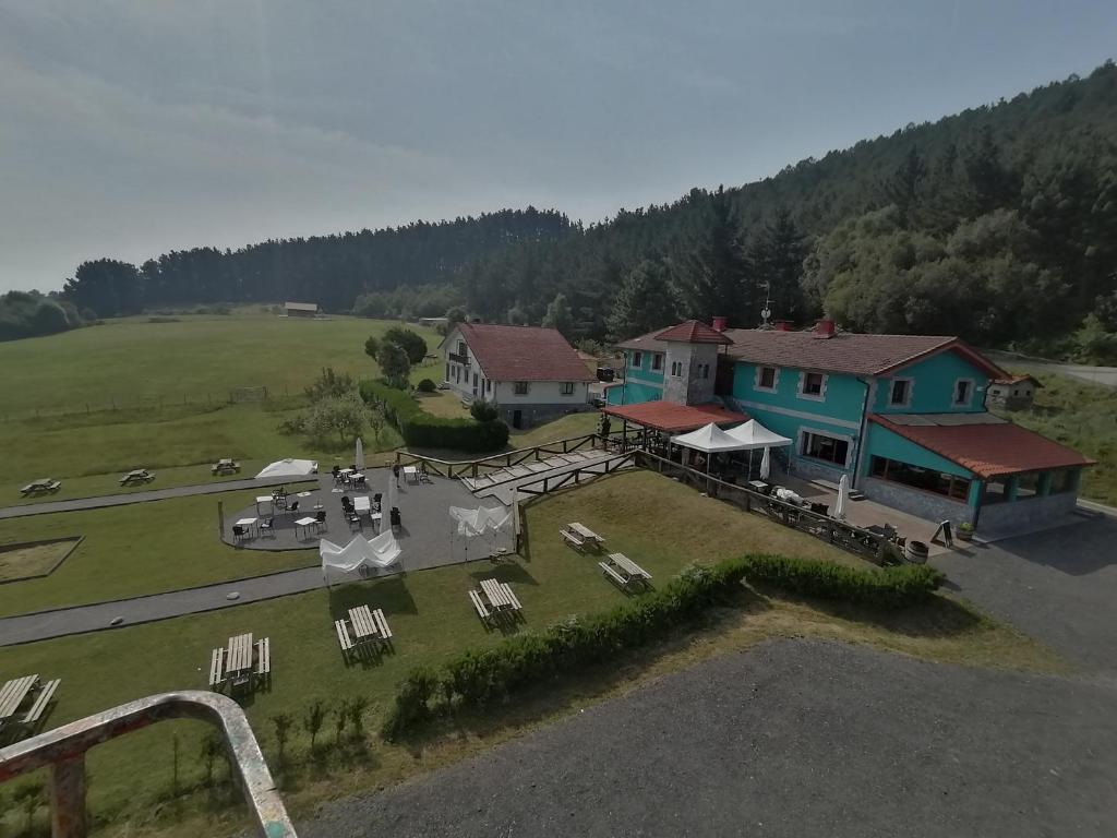 an aerial view of a house with a large yard at Pikua Landetxea in Mutriku