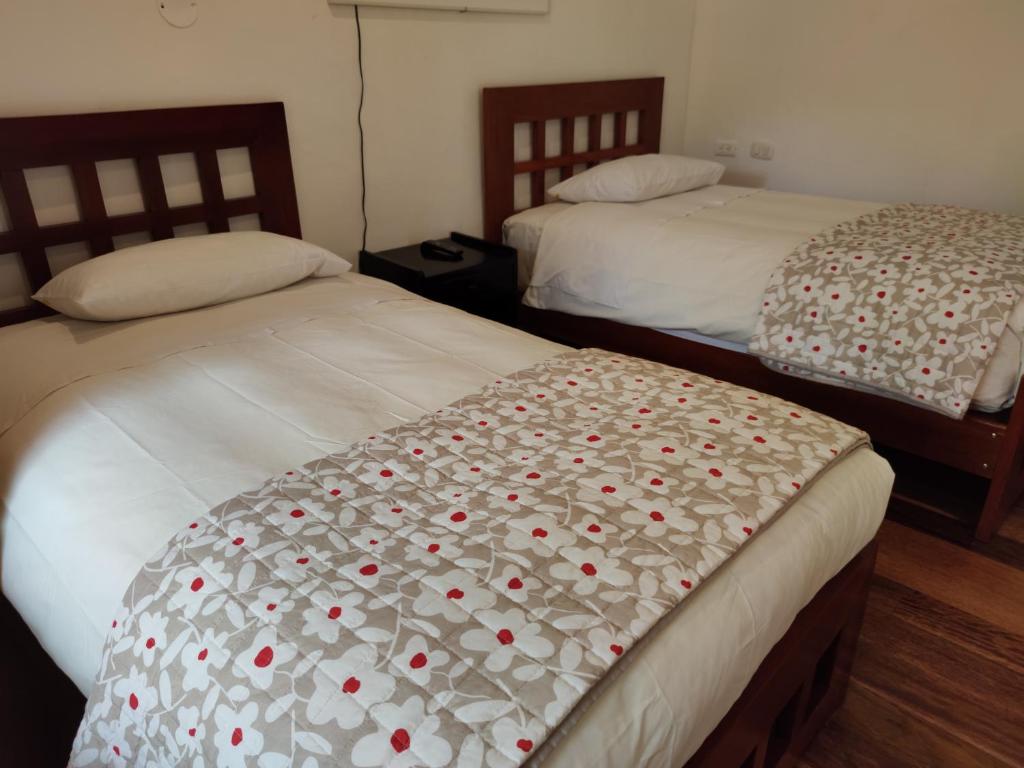 Postel nebo postele na pokoji v ubytování Hosteria de Anita