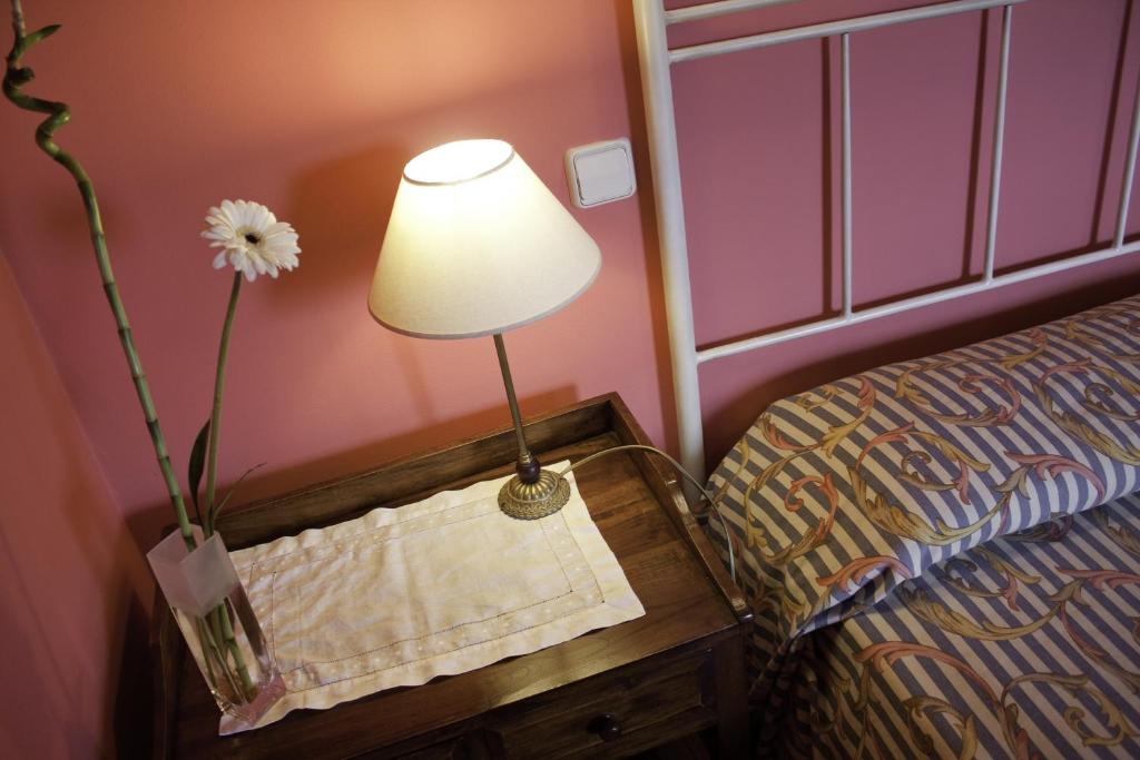 Cama o camas de una habitación en Posada La Casona de Los Güelitos